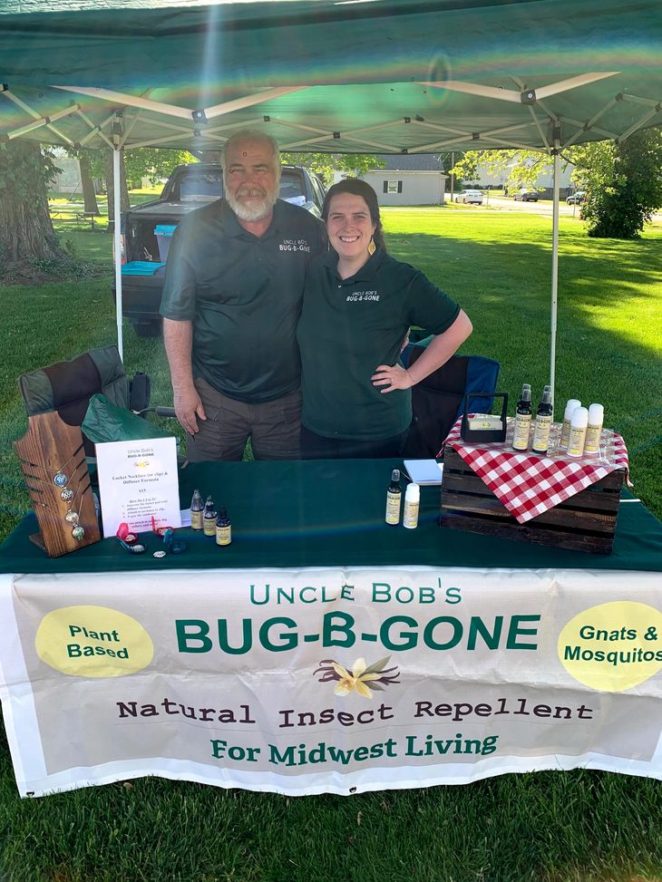 Uncle Bob and family at a farmers market booth